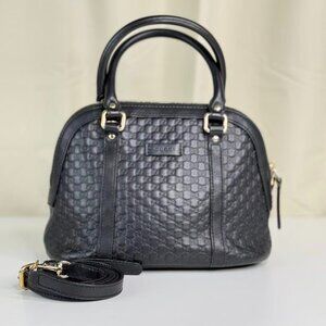 Gucci GG Logo Printed Black Leather Crossbody Bag - Sleek & Elegant Design